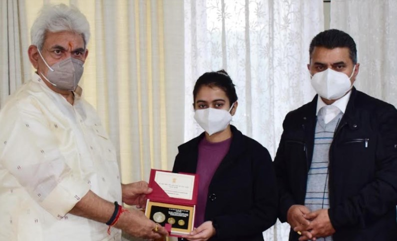 Lt Governor felicitates young Chess Champion Arushi Kotwal