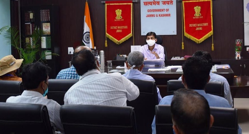 DC Jammu reviews progress of Languishing projects, status of Covid vaccination