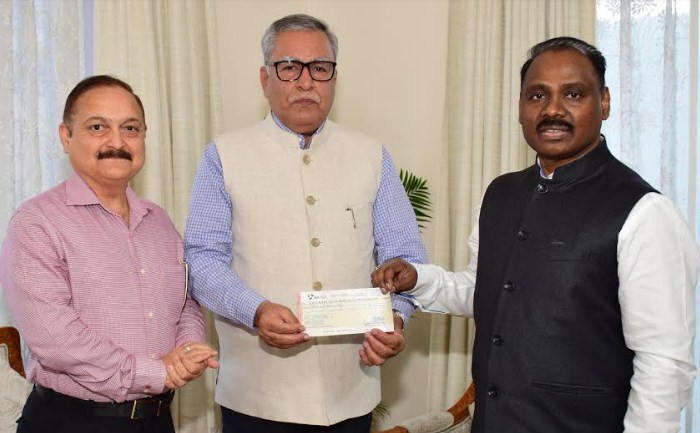 Advisor Khan presents cheque of Rs 5 cr towards J&K Relief Fund on behalf of Haj & Auqaf Department