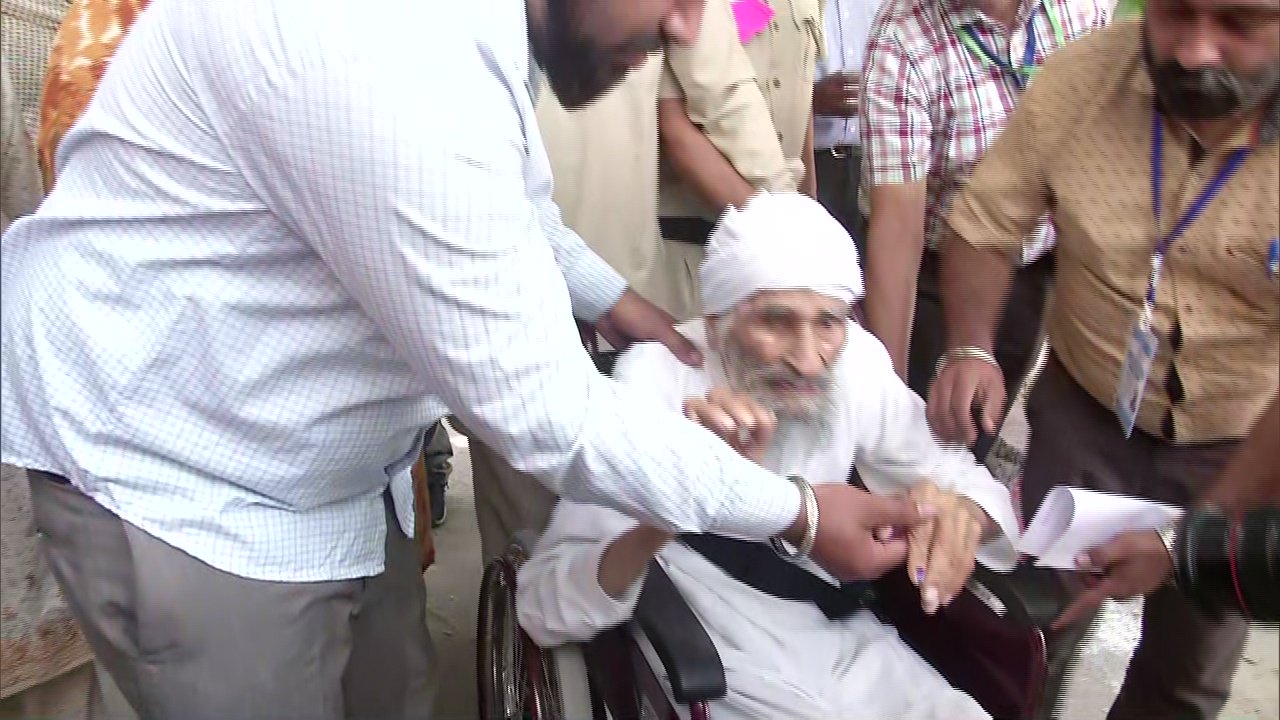 111-year old voter, Bachan Singh casts his vote in New Delhi