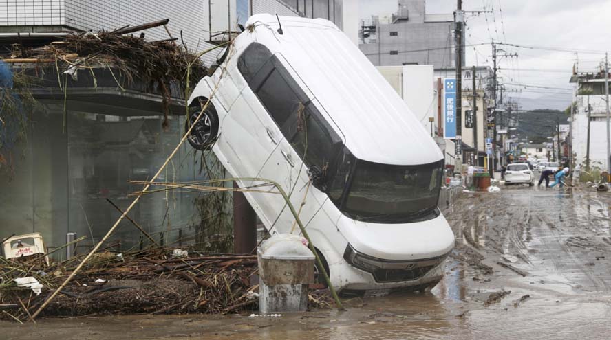 Japan floods: Desperate searches as dozens feared dead