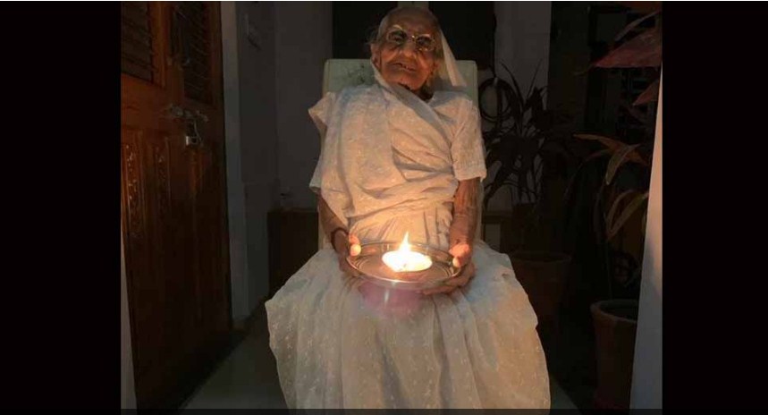 PM Modi's mother joins nation by lighting diya to mark fight against coronavirus COVID-19