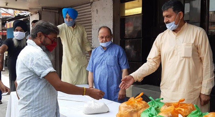 Jugal distributes Ration in Talab Tillo, Bakshi Nagar