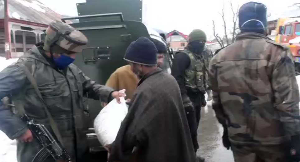 COVID-19: Indian Army distributes rice and other food items in Kashmir's Shopian