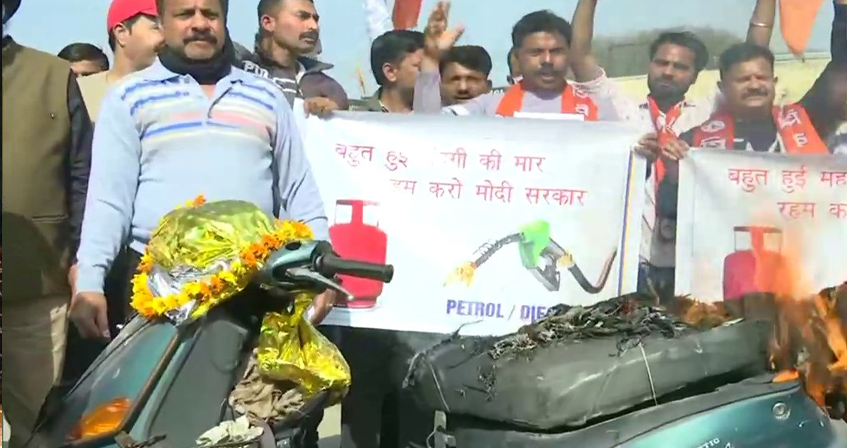Jammu and Kashmir: Shiv Sena leaders set scooty on fire during protest against fuel price hike