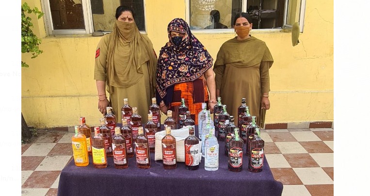 Lady bootlegger arrested with liquor in Khour