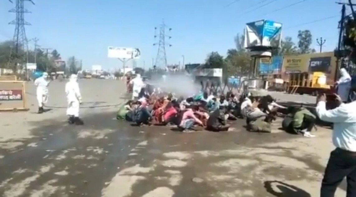 Coronavirus: Migrants sprayed with disinfectants on road in UP, Bareilly DM assures action