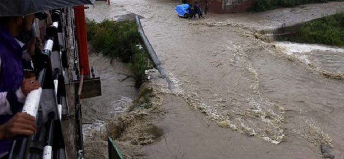 Woman Killed In Flash Floods Triggered By Cloudbursts; Houses, Crops Damaged, Foot Bridge Washed Away In Lolab