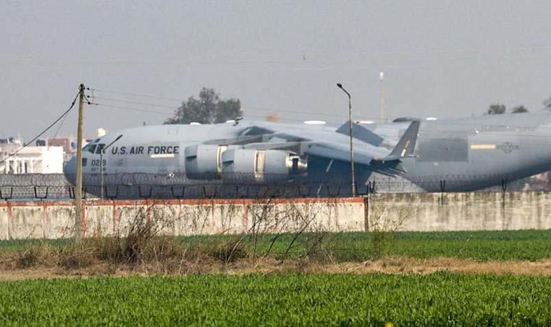 US plane lands in Amritsar: One deportee claims they were shackled; 2 held in murder case