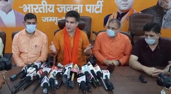 Dialogue and gun cannot go together: Ravinder Raina