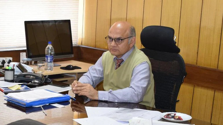 State Election Commissioner Sharma interacts with District Panchayat Election Officers