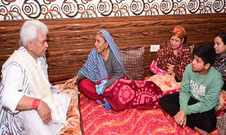 LG Sinha visits family members of SGCT Ravi Kumar who died in road accident