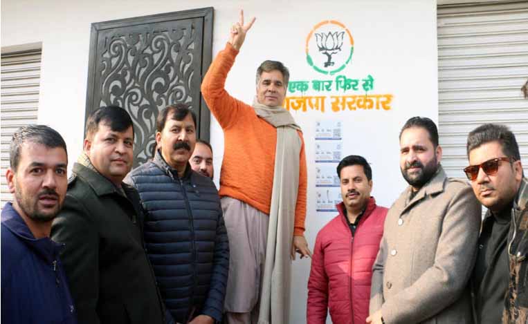 Ravinder Raina starts BJP wall writing campaign in J&K, draws party symbol