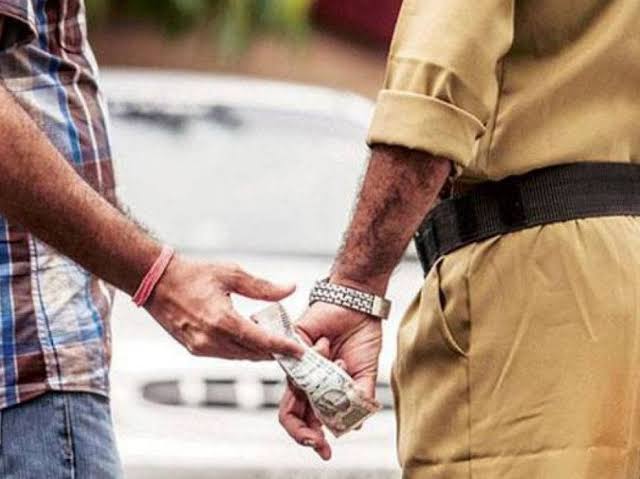 Manager State Forest Corporation caught red handed accepting bribe