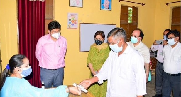 Div com visits District Hospital Samba