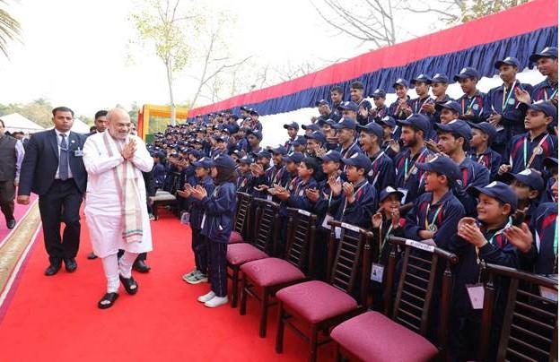 Amit Shah interacts with J-K children in Delhi,  appeals to promote peace, reject terrorism